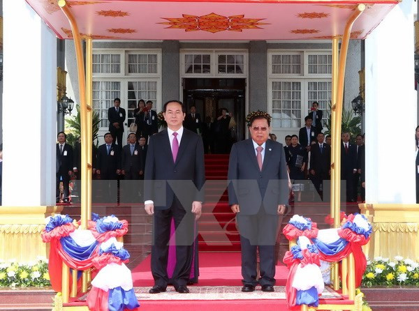 Presidente vietnamita arriba a Vientiane para iniciar visita estatal a Laos ảnh 1 Presidente vietnamita arriba a Vientiane para iniciar visita estatal a Laos ảnh 1