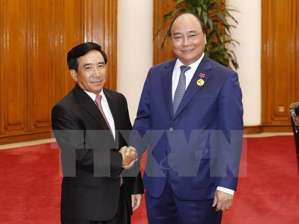 Vietnam y Laos: juntos en la construcción nacional y la integración internacional ảnh 1 Vietnam y Laos: juntos en la construcción nacional y la integración internacional ảnh 1