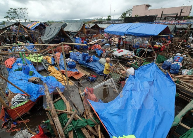 Al menos tres muertos en Filipinas tras paso de tifón Nock-Ten ảnh 1 Al menos tres muertos en Filipinas tras paso de tifón Nock-Ten ảnh 1
