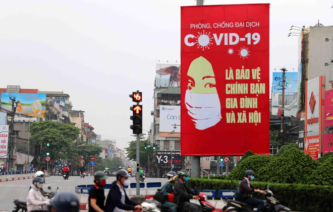 Experto ruso destaca eficiencia de uso de carteles en combate antiepidémico en Vietnam ảnh 1 Experto ruso destaca eficiencia de uso de carteles en combate antiepidémico en Vietnam ảnh 1