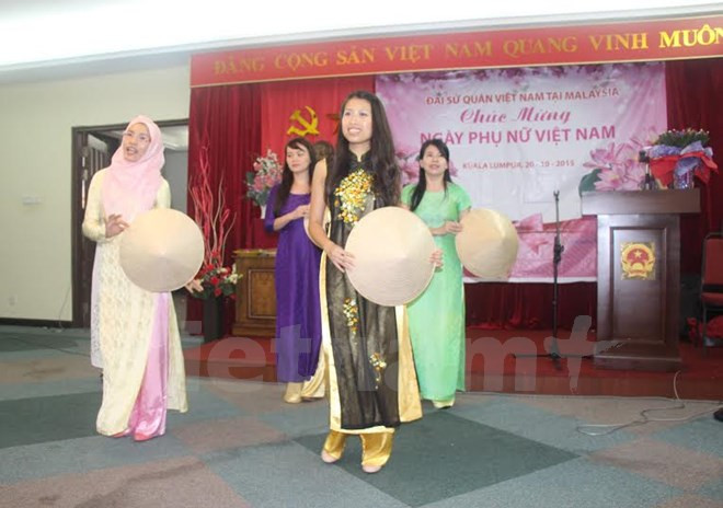 Club de Mujeres vietnamitas celebra su día en Malasia ảnh 1  Club de Mujeres vietnamitas celebra su día en Malasia ảnh 1