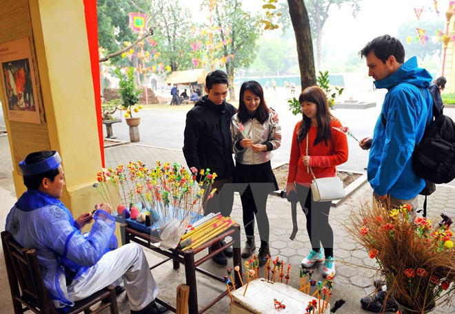 Disfrutan de atmosfera de Tet en Museo de Hanoi ảnh 1 Disfrutan de atmosfera de Tet en Museo de Hanoi ảnh 1