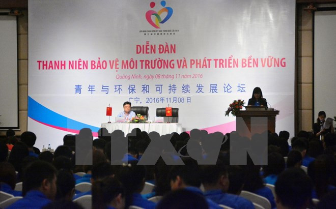 Jóvenes vietnamitas y chinos juntan manos por medioambiente ảnh 1