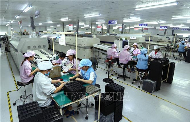Empresas vietnamitas reanudan actividades de producción y comercio ảnh 2 Empresas vietnamitas reanudan actividades de producción y comercio ảnh 2