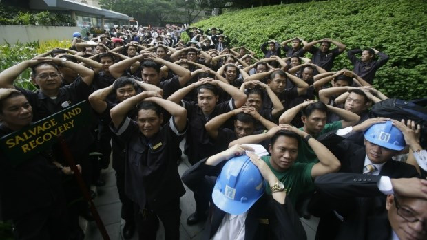 Miles de filipinos ejercitan defensas ante terremoto en Manila ảnh 1 Miles de filipinos ejercitan defensas ante terremoto en Manila ảnh 1