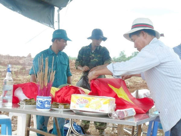 Repatriados restos de mártires vietnamitas caídos en Laos ảnh 1 Repatriados restos de mártires vietnamitas caídos en Laos ảnh 1