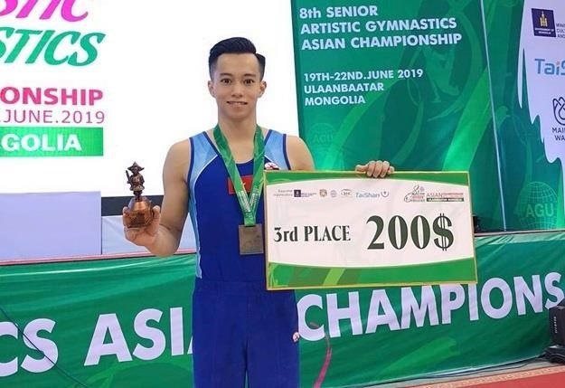 Ganan gimnastas vietnamitas dos medallas de bronce en torneo asiático ảnh 1
