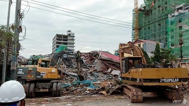 Tres muertos y 10 heridos por derrumbe de edificio en Camboya ảnh 1