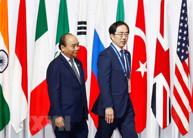 Primer ministro vietnamita se reúne con ejecutivos de grandes empresas tecnológicas japonesas ảnh 1