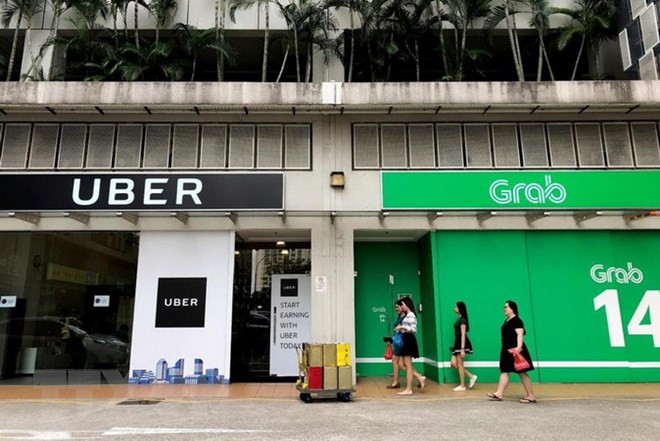 Singapur establece medidas provisionales para la fusión Grab-Uber ảnh 1 Singapur establece medidas provisionales para la fusión Grab-Uber ảnh 1