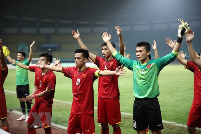 Periódicos de Asia elogian racha victoriosa de fútbol vietnamita en ASIAD 2018 ảnh 1
