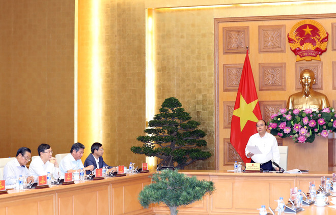 Premier de Vietnam pide asesoramiento de expertos sobre estrategia de desarrollo económico ảnh 1