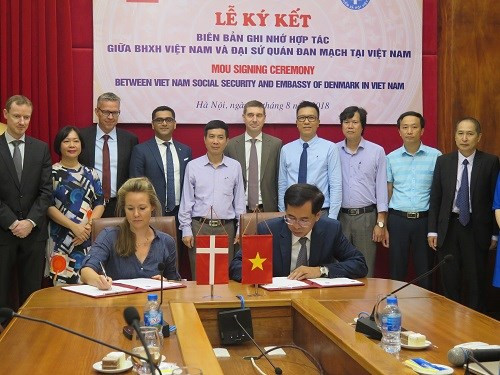 Vietnam y Dinamarca firman un acuerdo de cooperación sobre seguro médico ảnh 1