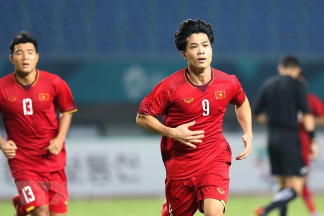 Vietnam clasifica por primera vez a los cuartos de final de fútbol en Juegos Asiáticos ảnh 1 Vietnam clasifica por primera vez a los cuartos de final de fútbol en Juegos Asiáticos ảnh 1