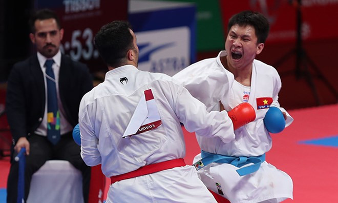 Vietnam gana una medalla de plata en karate en ASIAD ảnh 1
