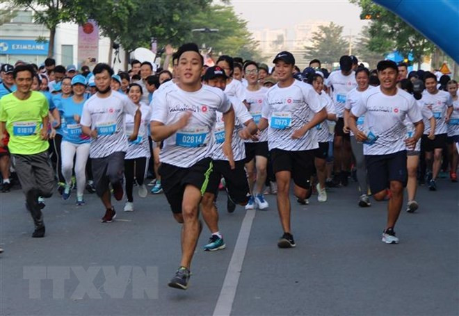 Nueve mil personas de 50 países y territorios corren en maratón en Ciudad Ho Chi Minh ảnh 1 Nueve mil personas de 50 países y territorios corren en maratón en Ciudad Ho Chi Minh ảnh 1