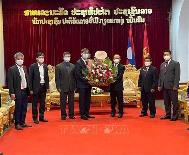 Consulado General de Vietnam saluda el Día Nacional de Laos ảnh 1 Consulado General de Vietnam saluda el Día Nacional de Laos ảnh 1