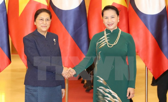 Parlamentos de Vietnam y Laos firman acuerdo de cooperación ảnh 1