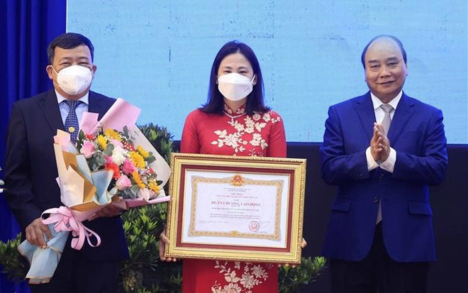 Presidente vietnamita otorga Orden de Trabajo al distrito de Cu Chi en Ciudad Ho Chi Minh ảnh 1 Presidente vietnamita otorga Orden de Trabajo al distrito de Cu Chi en Ciudad Ho Chi Minh ảnh 1