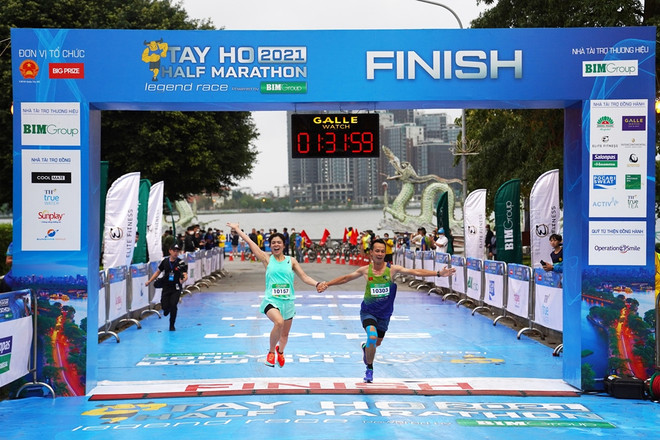 Casi tres mil participantes en Medio Maratón Tay Ho 2021 ảnh 1 Casi tres mil participantes en Medio Maratón Tay Ho 2021 ảnh 1