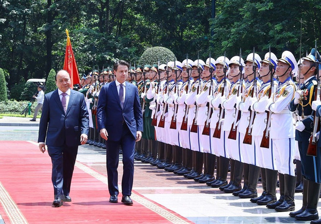 Concluye premier de Italia visita oficial a Vietnam ảnh 1 Concluye premier de Italia visita oficial a Vietnam ảnh 1