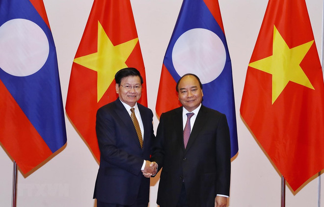 Premier vietnamita recibe a su homólogo laosiano ảnh 1 Premier vietnamita recibe a su homólogo laosiano ảnh 1