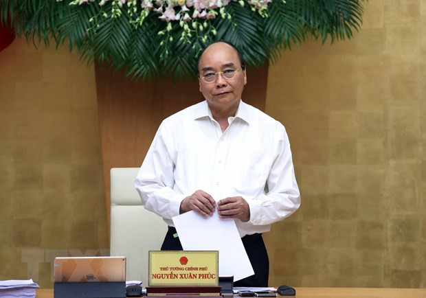Primer ministro de Vietnam insta a lograr crecimiento económico alto en medio del COVID-19 ảnh 1 Primer ministro de Vietnam insta a lograr crecimiento económico alto en medio del COVID-19 ảnh 1