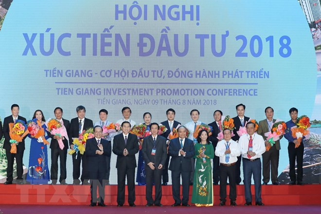 Premier vietnamita asiste a conferencia de promoción inversionista en Tien Giang ảnh 1 Premier vietnamita asiste a conferencia de promoción inversionista en Tien Giang ảnh 1