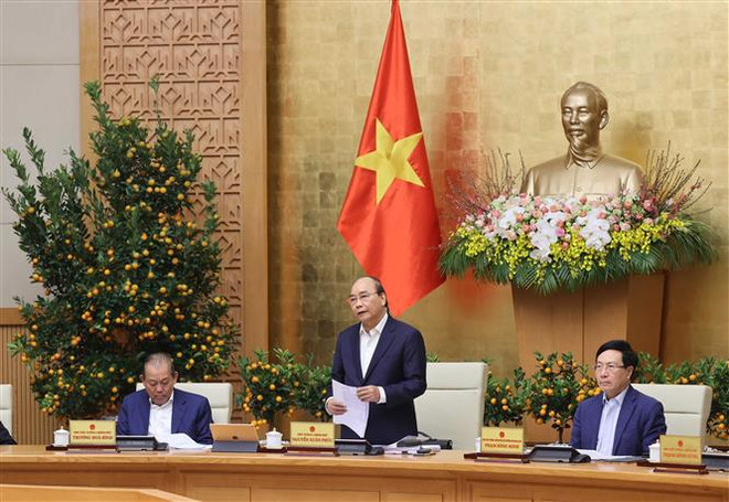 Primer Ministro de Vietnam insta a fortalecer control epidémico ante festividades del Tet ảnh 1