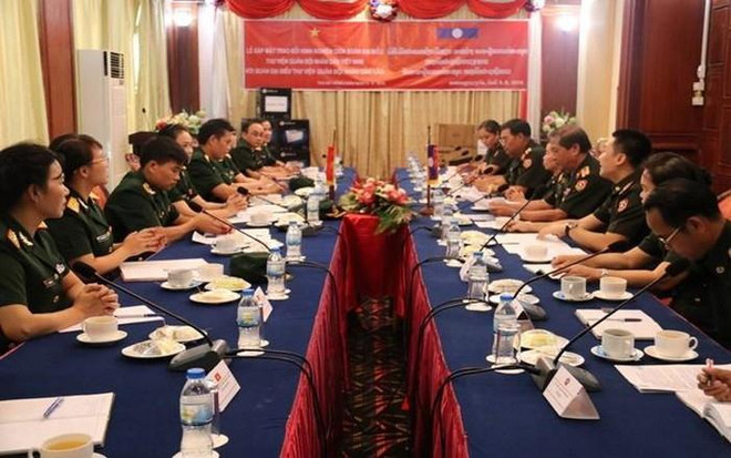 Vietnam y Laos estrechan cooperación en bibliotecología militar ảnh 1