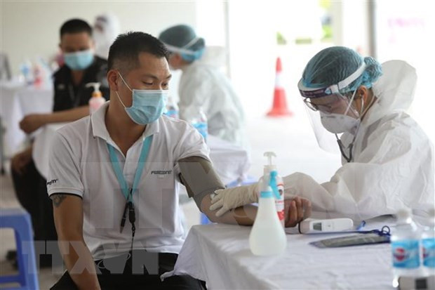 Vietnam compite contrarreloj para proteger parques industriales del COVID-19 ảnh 3