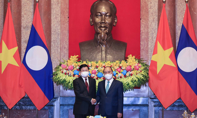 Presidente vietnamita se reúne con máximo dirigente de Laos ảnh 1 Presidente vietnamita se reúne con máximo dirigente de Laos ảnh 1