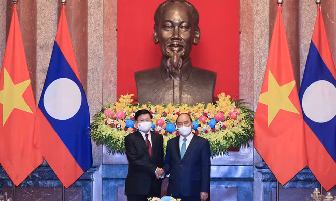 Presidente vietnamita se reúne con máximo dirigente de Laos ảnh 1
