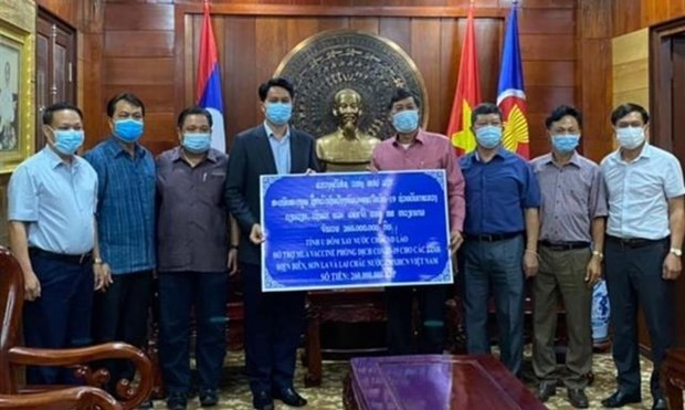 Laos ayuda a localidades vietnamitas en combate contra COVID-19 ảnh 1