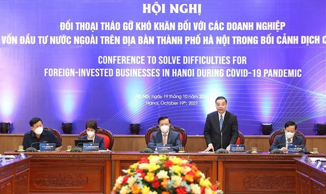 Hanoi se compromete a crear condiciones favorables para inversores extranjeros ảnh 2
