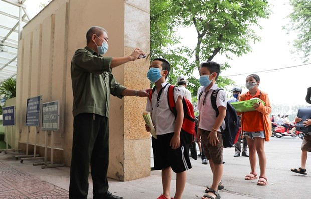 Diario estadounidense destaca medidas eficientes de Vietnam contra coronavirus ảnh 1