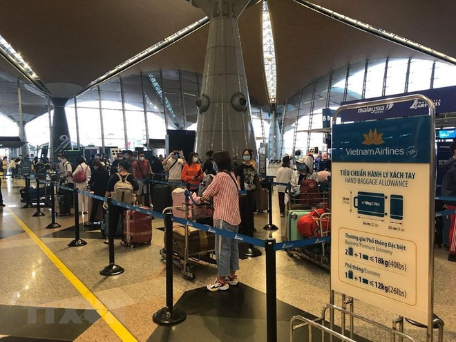 Vietnamitas en Malasia regresan al país de manera segura ảnh 1 Vietnamitas en Malasia regresan al país de manera segura ảnh 1
