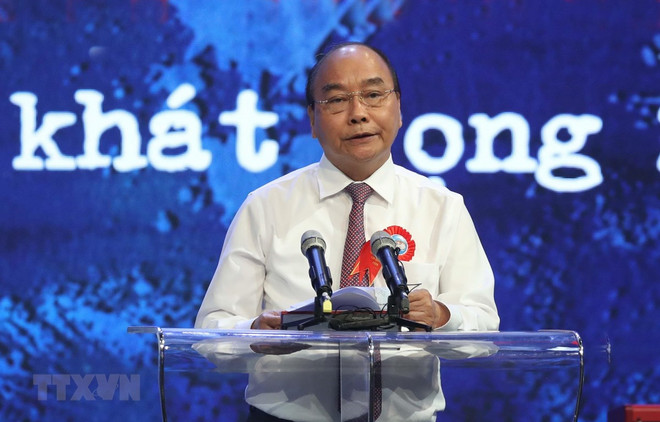 Seguir ejemplo moral del Tío Ho es misión del sistema político, afirma premier vietnamita ảnh 1