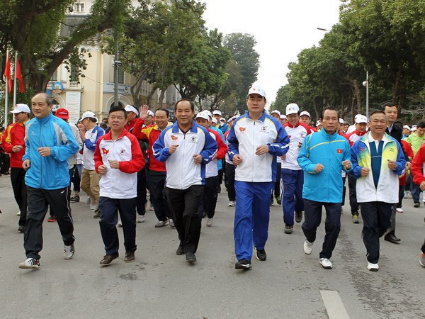 Localidades vietnamitas responden al Día de la Carrera Olímpica por la Salud Pública ảnh 1 Localidades vietnamitas responden al Día de la Carrera Olímpica por la Salud Pública ảnh 1