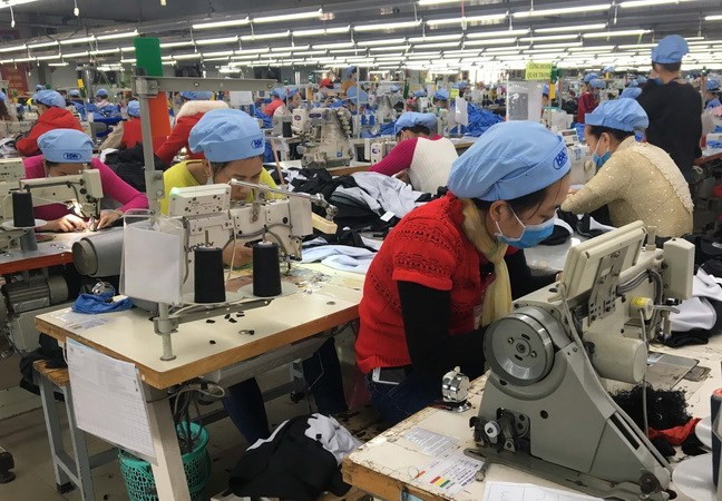 Exportaciones de textiles y calzado de Vietnam crecerán con firma del CPTPP ảnh 1