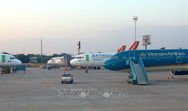 Vietnamitas en Laos muestran gratitud al Gobierno connacional ảnh 1 Vietnamitas en Laos muestran gratitud al Gobierno connacional ảnh 1