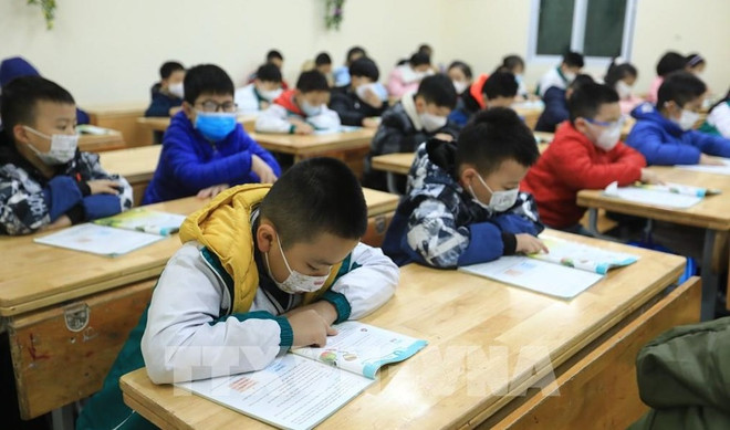 Alumnos hasta sexto grado regresan a las escuelas en Hanoi ảnh 1 Alumnos hasta sexto grado regresan a las escuelas en Hanoi ảnh 1