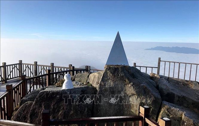 Escarcha adorna nuevamente cima del monte Fansipan en Vietnam ảnh 4 Escarcha adorna nuevamente cima del monte Fansipan en Vietnam ảnh 4