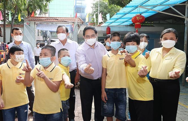 Primer ministro pide a Ciudad Ho Chi Minh continuar campañas de vacunación ảnh 3 Primer ministro pide a Ciudad Ho Chi Minh continuar campañas de vacunación ảnh 3
