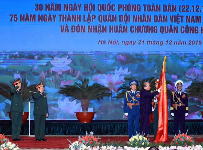 Gran ceremonia marca aniversario 75 del Ejército Popular de Vietnam ảnh 1 Gran ceremonia marca aniversario 75 del Ejército Popular de Vietnam ảnh 1