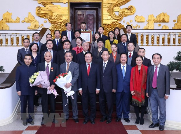 Vicepremier y canciller Pham Binh Minh recibe delegados del Foro del Pueblo Vietnam-China ảnh 1 Vicepremier y canciller Pham Binh Minh recibe delegados del Foro del Pueblo Vietnam-China ảnh 1