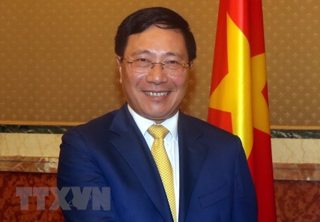 Vicepremier y canciller de Vietnam asiste al Foro empresarial con Reino Unido ảnh 1 Vicepremier y canciller de Vietnam asiste al Foro empresarial con Reino Unido ảnh 1