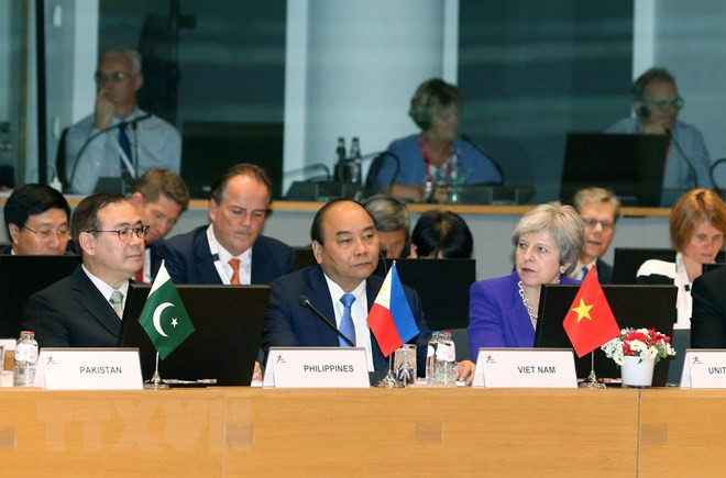 ASEM 12: Europa busca apoyo asiático en temas clave ảnh 1