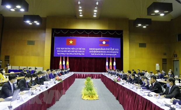 Vietnam y Laos buscan facilitar circulación de mercancías en frontera terrestre común ảnh 1