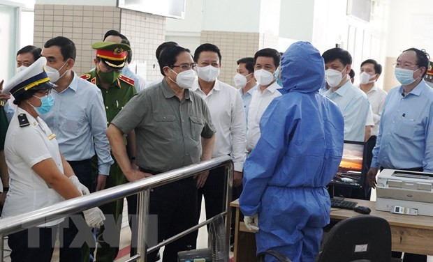 Primer Ministro inspecciona labores preventivas de COVID-19 en Ciudad Ho Chi Minh ảnh 1 Primer Ministro inspecciona labores preventivas de COVID-19 en Ciudad Ho Chi Minh ảnh 1